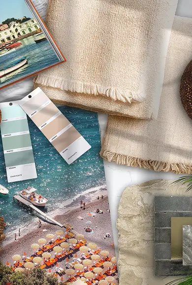 Flat lay of beach-inspired design elements with fabric swatches, paint samples, and a coastal photo.