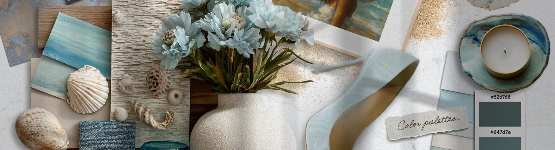 Flat lay with soft blue florals, seashells, coastal artwork, and an elegant light blue heel.