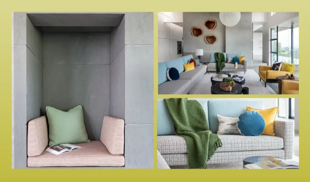 Grace Blu’s project built-in seating nook with soft green pillows, couch and colorful pillows with green blanket.
