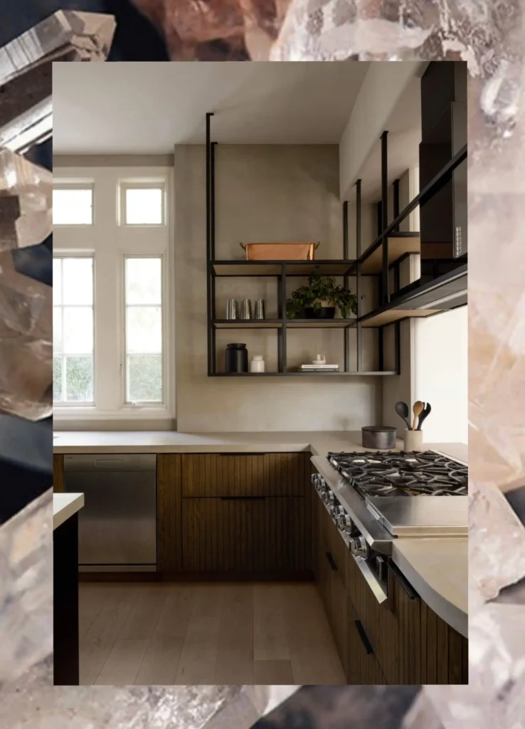 Modern kitchen with tall windows, open black shelving, natural wood cabinets and stainless gas stove by Grace Blu Interior Design.