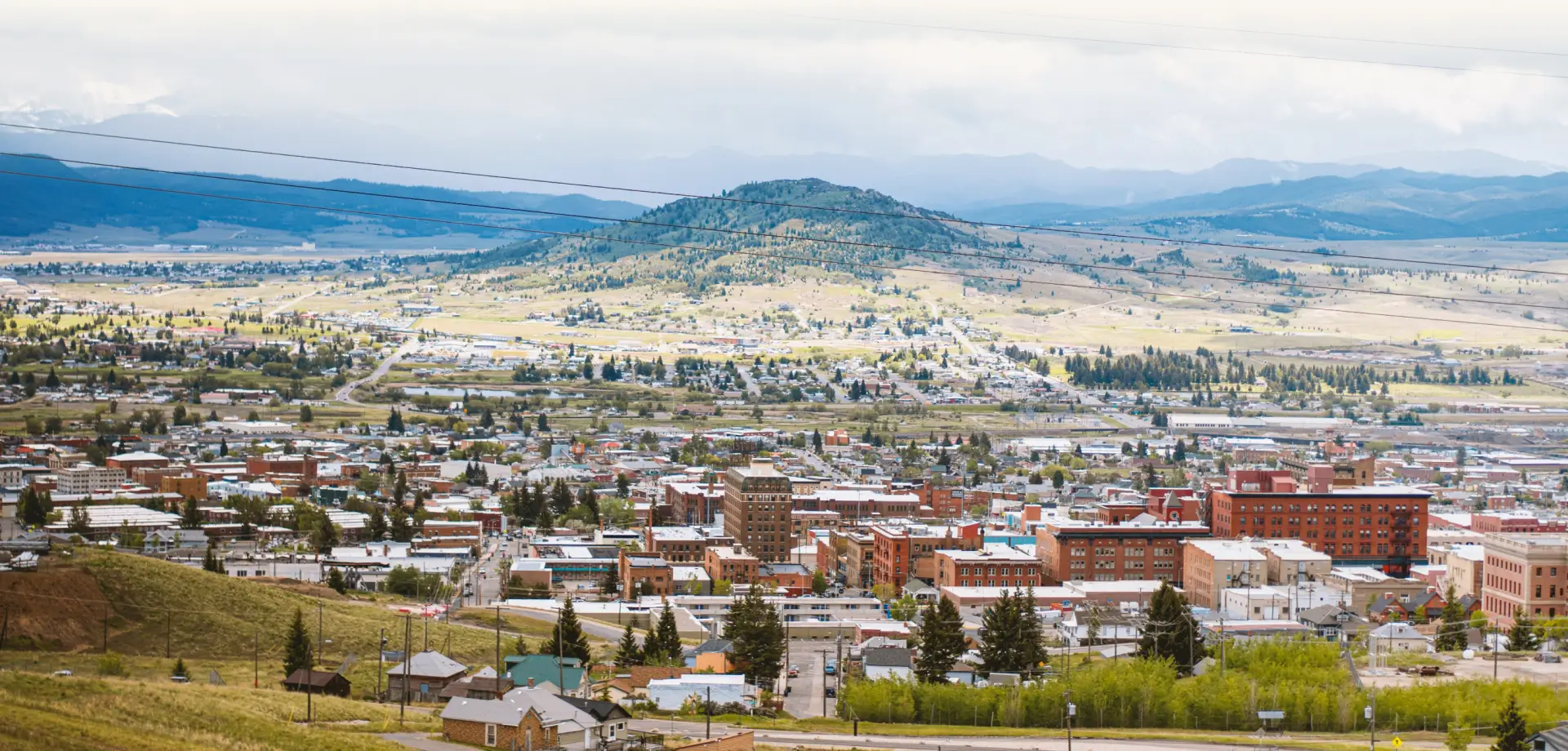 Aerial view of the city in Big Sky with mountains in the background